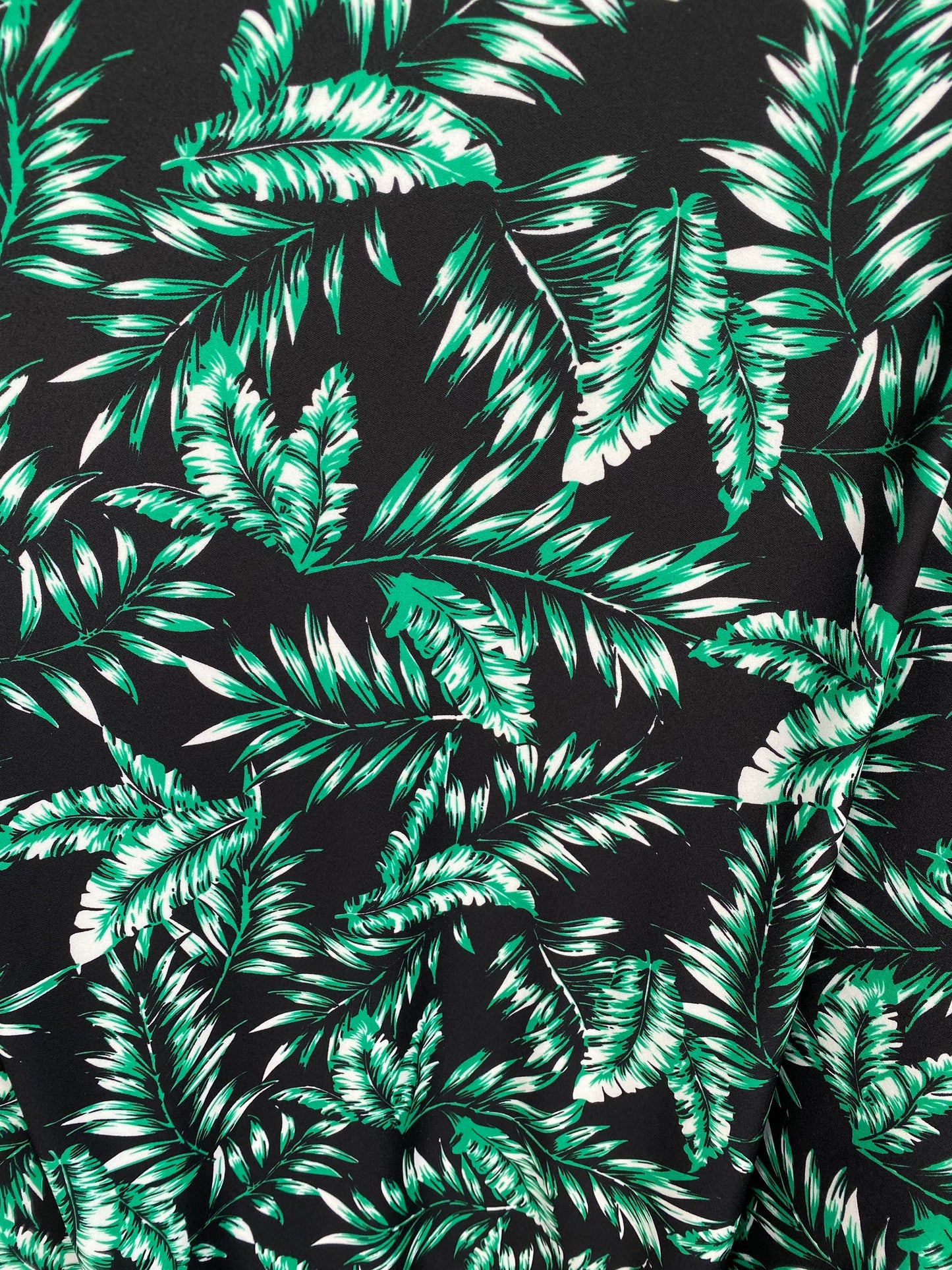 New palm leaf design print on poly spandex 2-way stretch medium weight 58/60” Sold by the YD. Ships Worldwide from Los Angeles California US