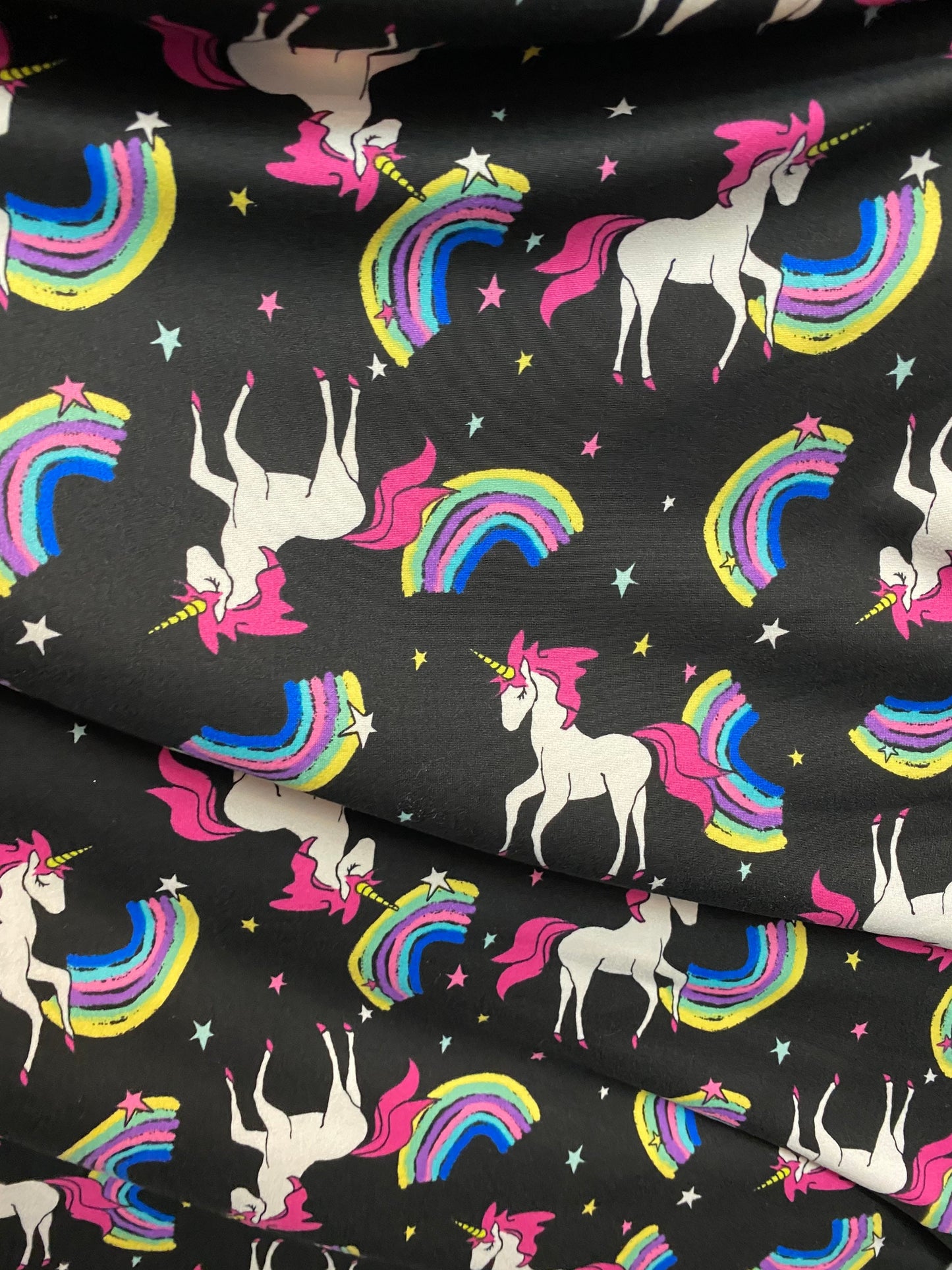 Unicorn design print on poly spandex matte 4way stretch medium weight 58/60” Sold by the YD. Ships Worldwide from Los Angeles California US