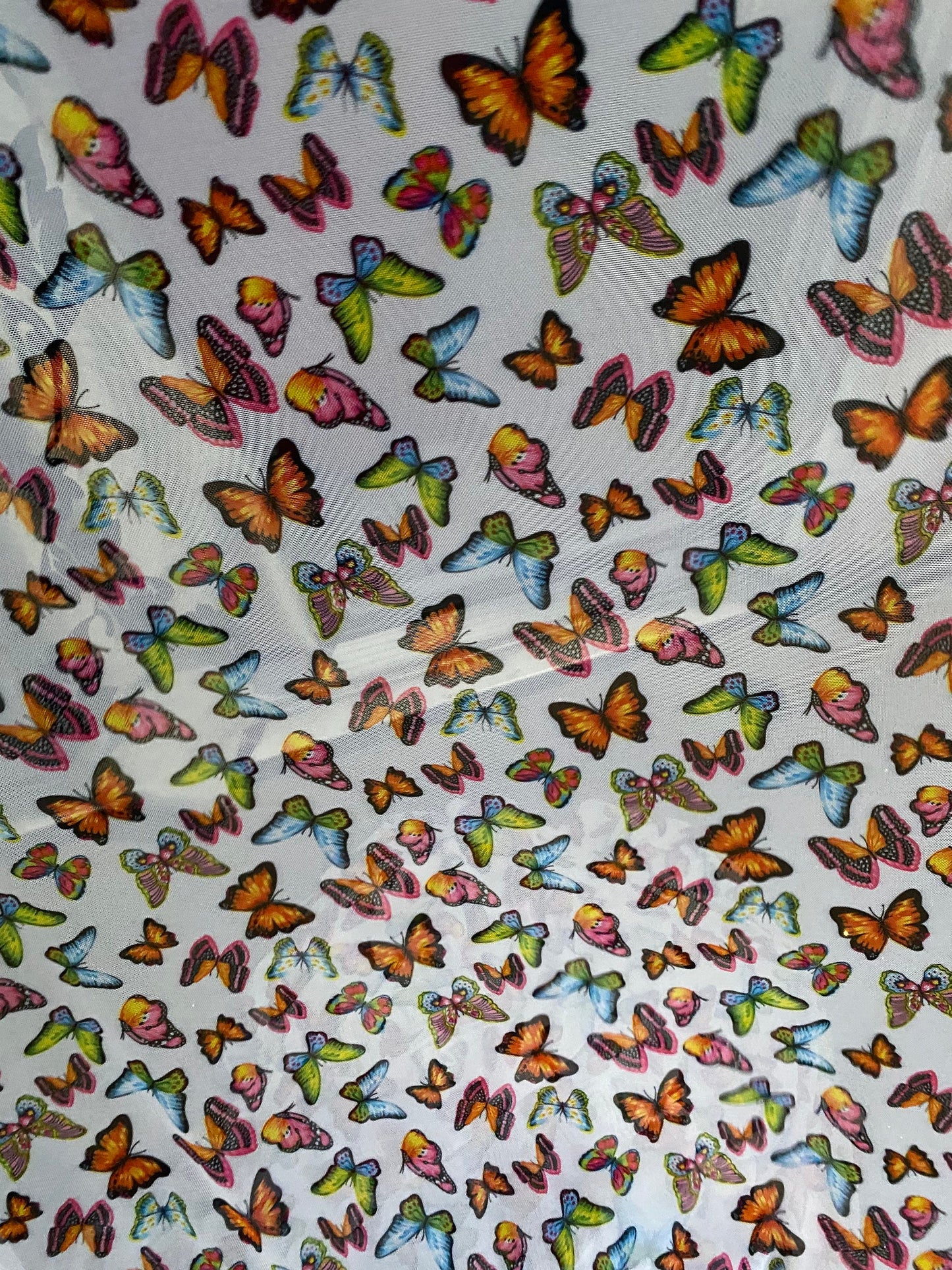 Exotic Butterflies design print on great power mesh 4-way stretch 58/60” Sold by the YD. Ships Worldwide from Los Angeles California USA.