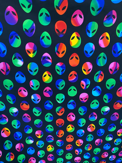 Alien design black/rainbow it glows in the dark with a black light print on best quality of nylon spandex 4-way stretch 58/60” Sold by the Y