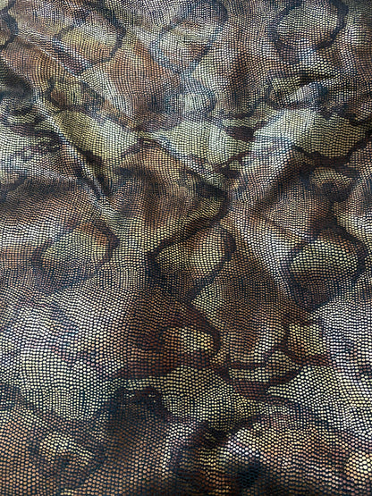 New Exotic Anaconda design print on poly stretch suede with foil 2-way stretch medium weight 58/60” Sold by the YD. Ships Worldwide