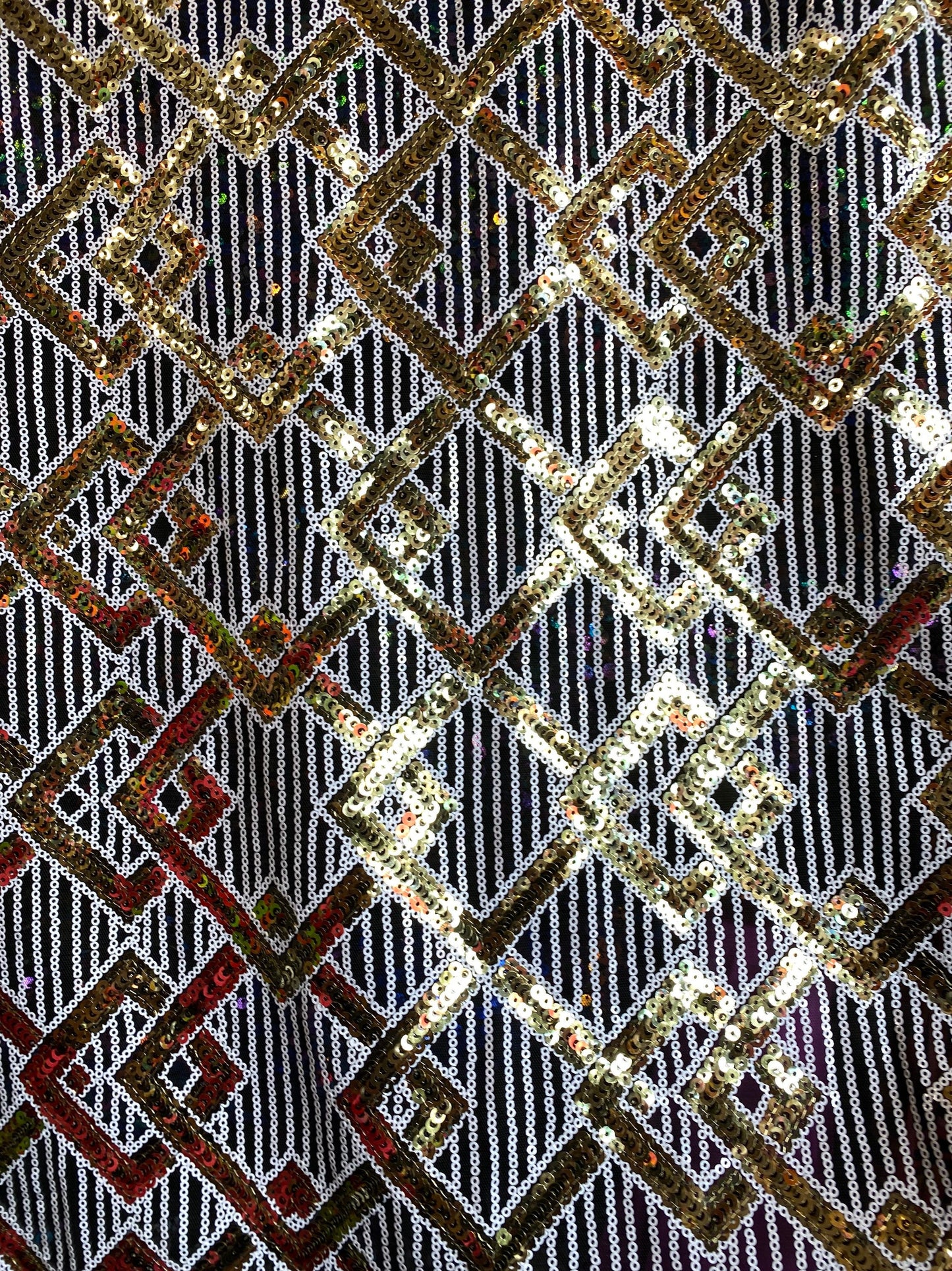 New geometric sequins Black/white/gold embroidered on stretch mesh 2-way 55/57” Sold by the YD. Ships Worldwide from Los Angeles California