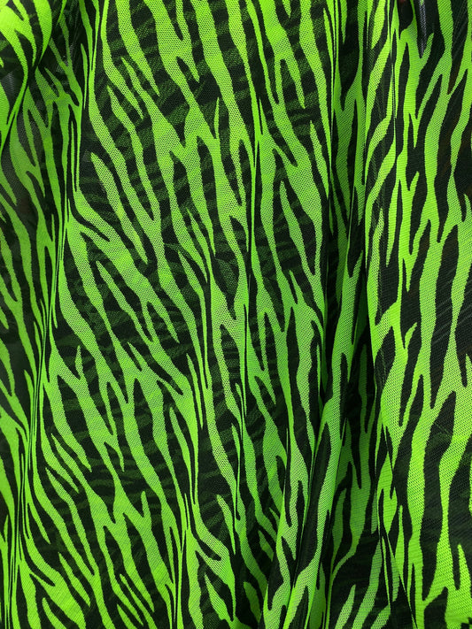 Exotic Zebra design Green/Black print on power mesh 4-way stretch 58/60” Sold by the YD. Ships Worldwide from Los Angeles California USA.