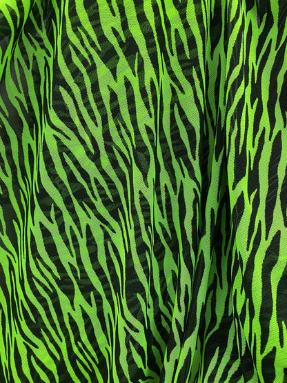 Exotic Zebra design Green/Black print on power mesh 4-way stretch 58/60” Sold by the YD. Ships Worldwide from Los Angeles California USA.