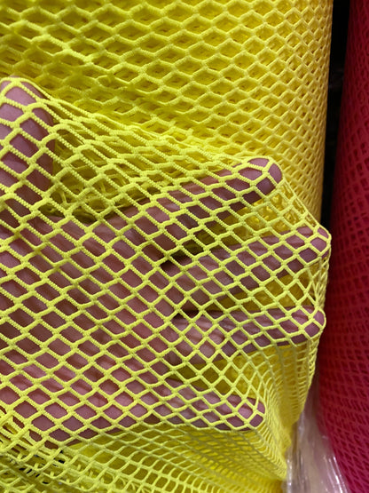 New fishnet medium size nylon spandex mesh 4-way stretch 58/60” Sold by the YD. Ships Worldwide from Los Angeles California USA.