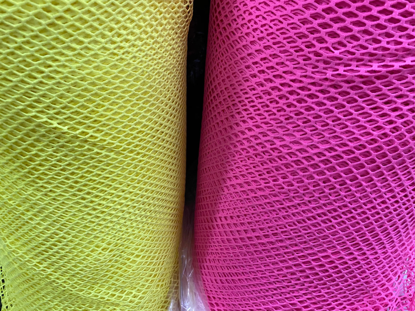 New fishnet medium size nylon spandex mesh 4-way stretch 58/60” Sold by the YD. Ships Worldwide from Los Angeles California USA.