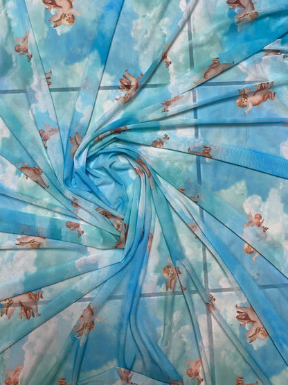 New Divine celestial Angels design Aqua blue color print on great quality of nylon power mesh 4-way stretch 58/60” Sold by the YD.