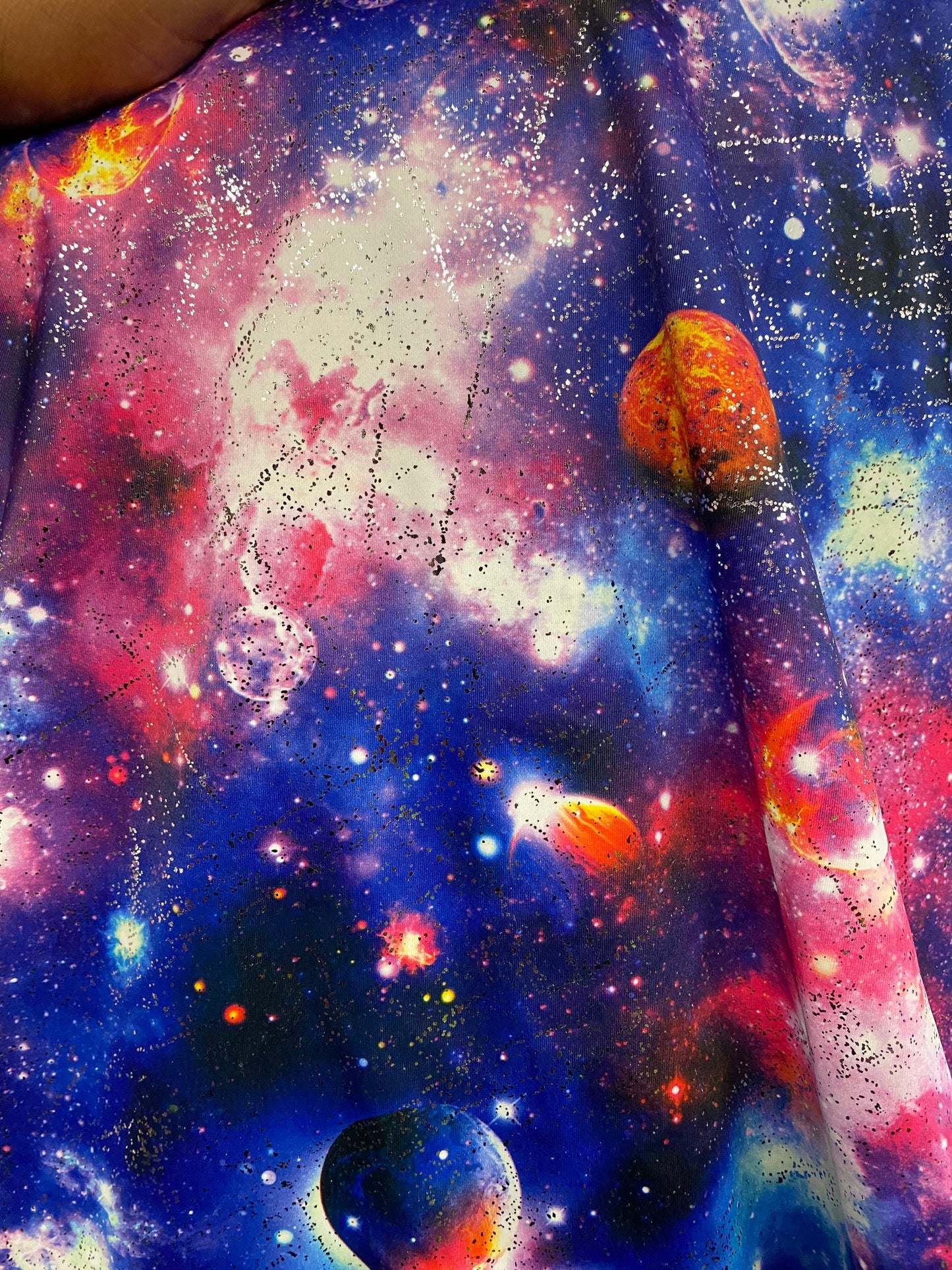 Galaxy design on nylon spandex with foil all over 58/60” 4way stretch Sold by the yd ships worldwide from Los Angeles California USA.