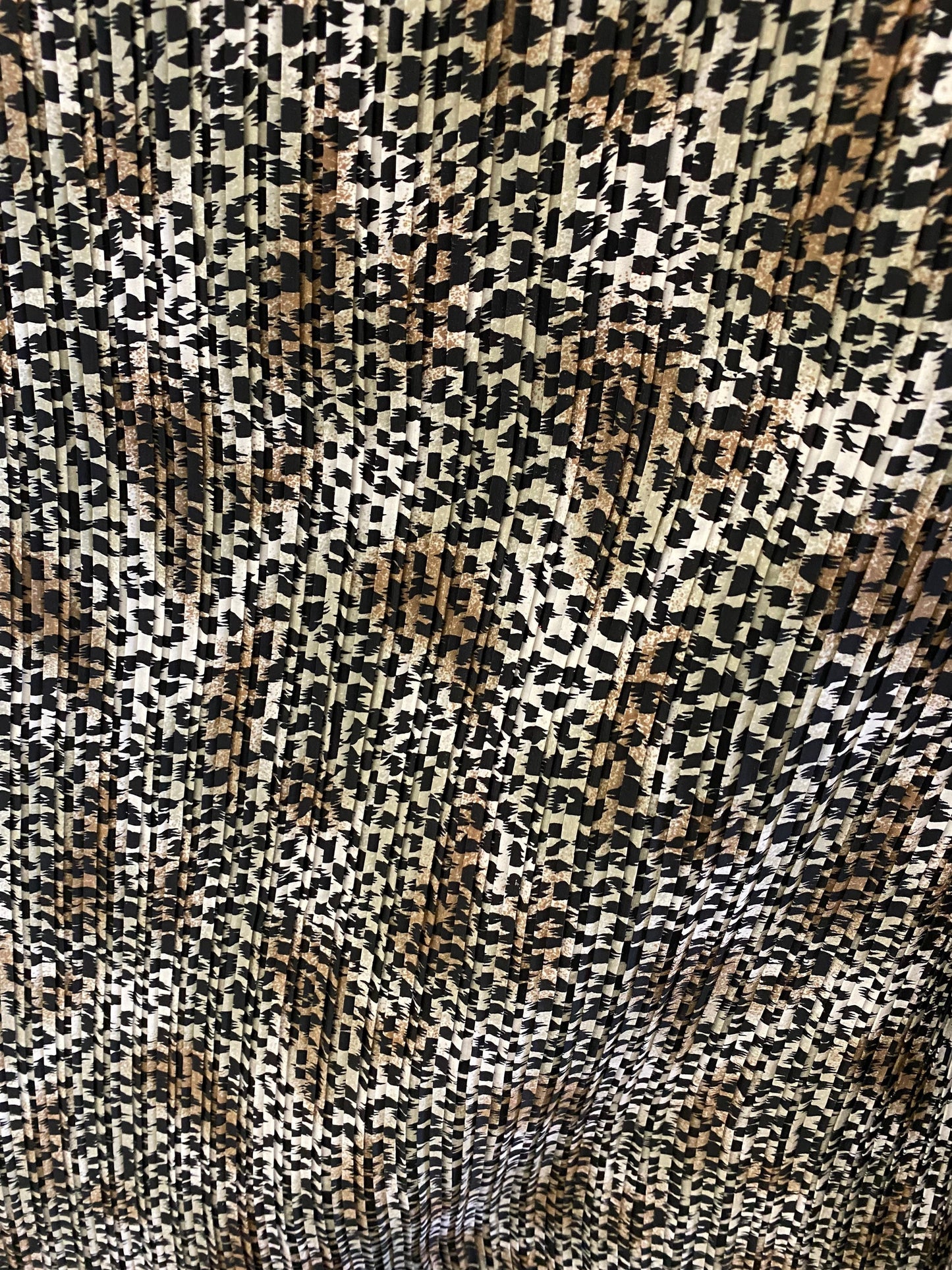 Exotic animal print leopard design print on pleated poly satin fabric 44/45” Sold by the YD. Ships Worldwide from Los Angeles California USA