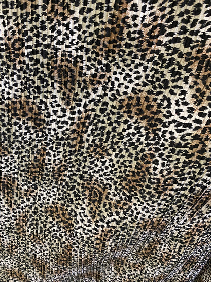 Exotic animal print leopard design print on pleated poly satin fabric 44/45” Sold by the YD. Ships Worldwide from Los Angeles California USA