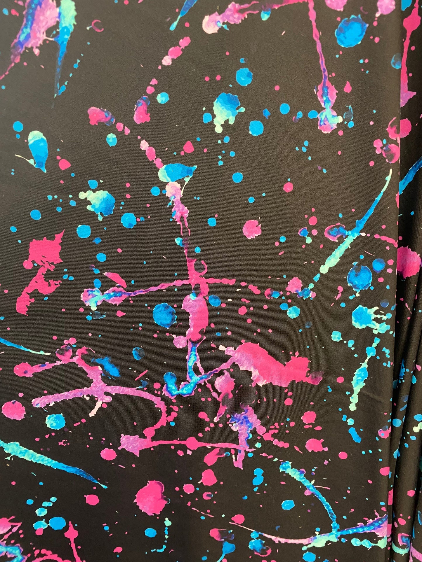 Graffiti paint design multicolor nylon spandex 4way Stretch 58/60” Sold by the YD. Ships worldwide from Los Angeles California USA.