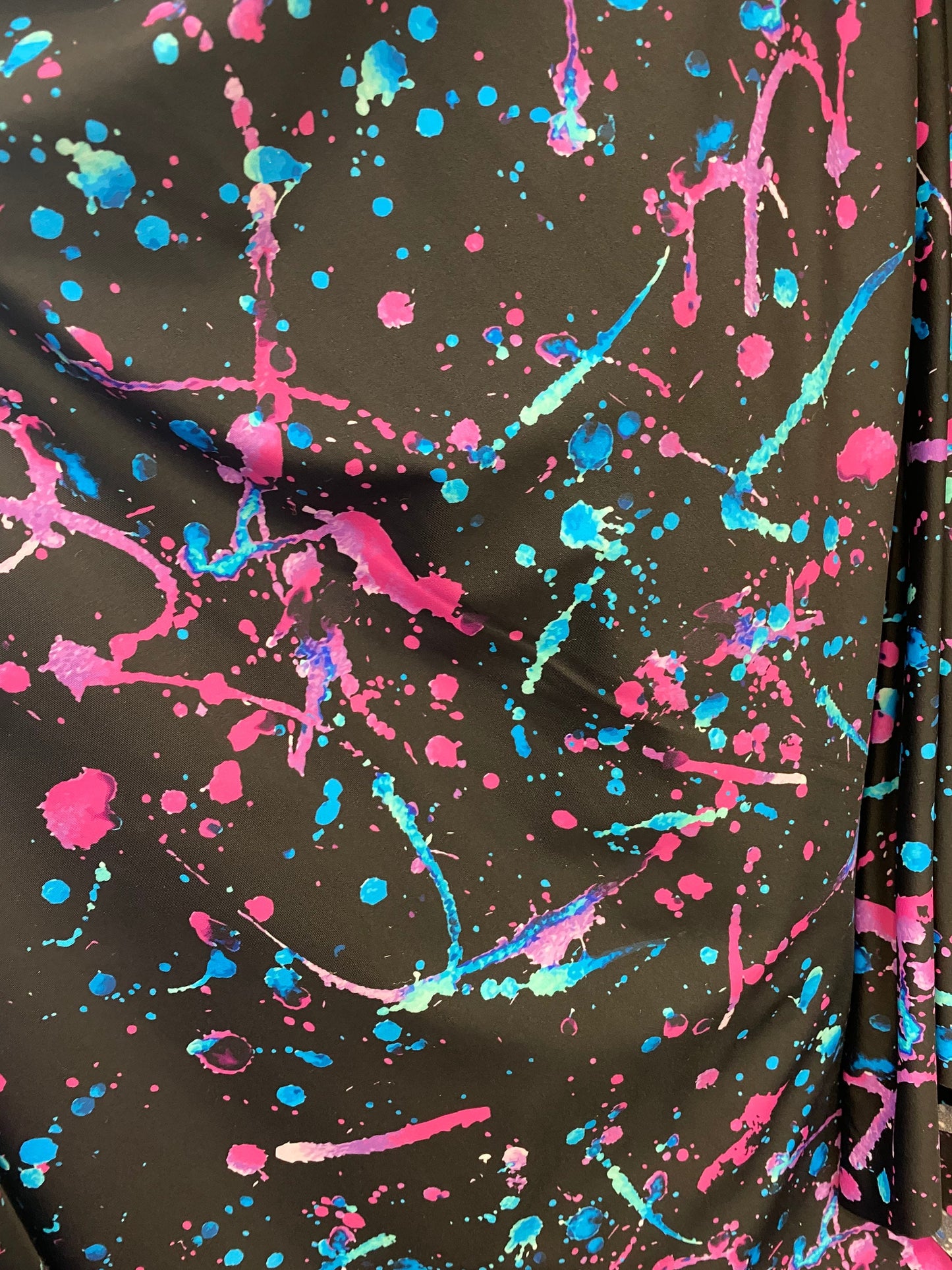 Graffiti paint design multicolor nylon spandex 4way Stretch 58/60” Sold by the YD. Ships worldwide from Los Angeles California USA.