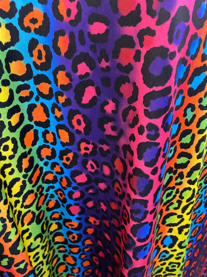 New Exotic rainbow leopard design print on great quality of nylon spandex;-way stretch 58/60” Sold by the YD. Ships Worldwide from L.A CA