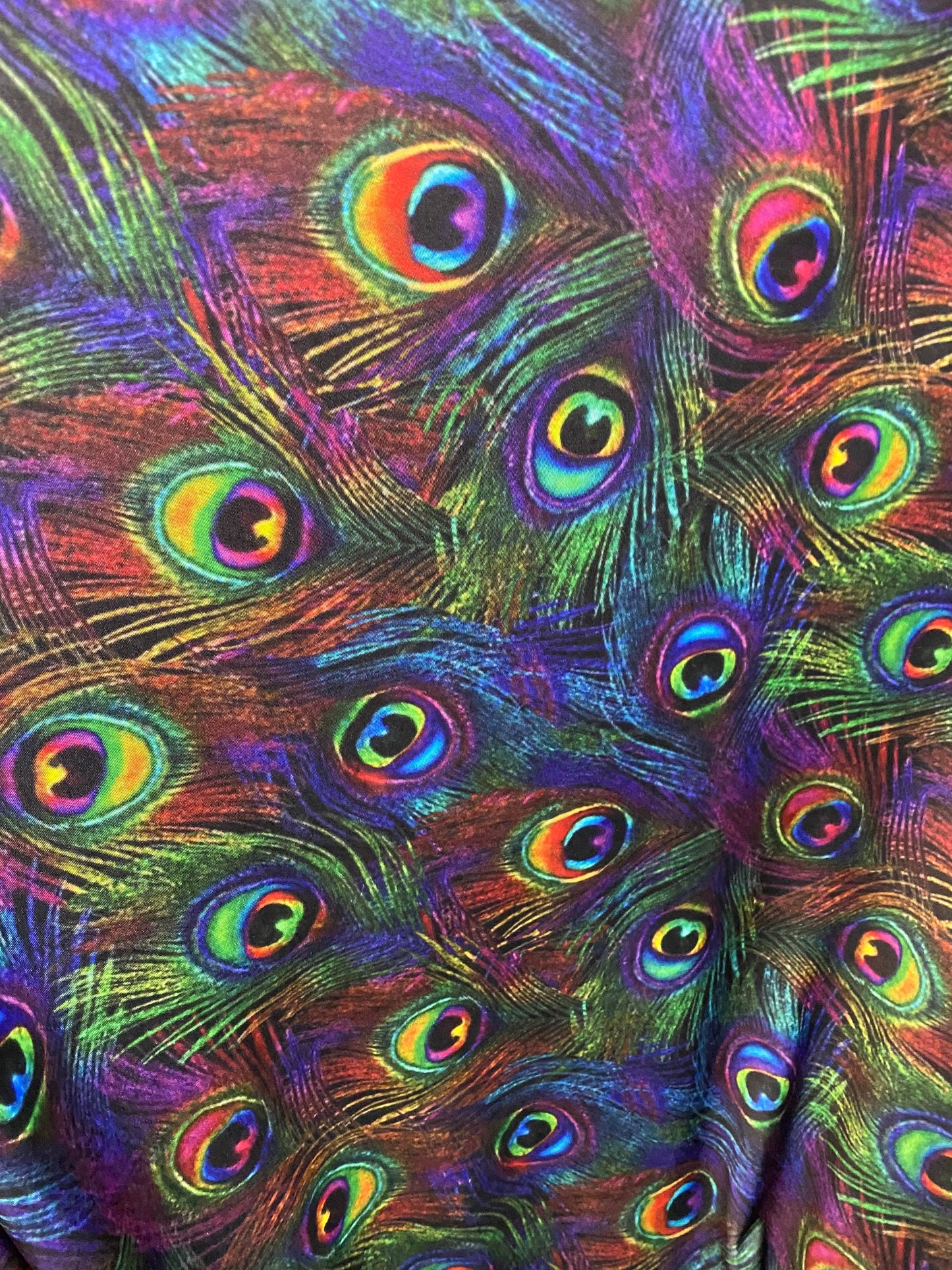 New Exotic peacock design rainbow color print on best quality of nylon spandex 4-way stretch 58/60” Sold by the YD. Ships Worldwide