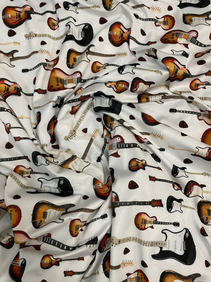 New Electric Guitar design print on great quality of nylon spandex 4-way stretch 58/60” Sold by the YD. Ships Worldwide from Los Angeles CA.