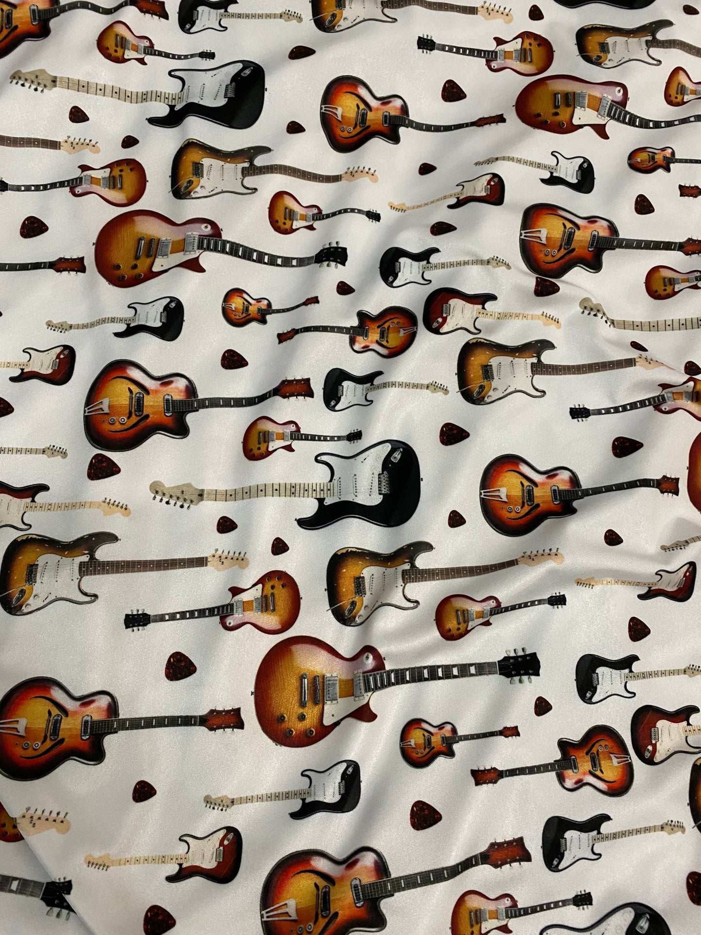 New Electric Guitar design print on great quality of nylon spandex 4-way stretch 58/60” Sold by the YD. Ships Worldwide from Los Angeles CA.