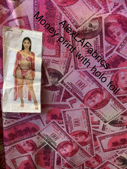 New Money design 100 dollar bill hologram pink/green with foil and without foil print on 4-way  nylon spandex  58/60” Sold by the YD.