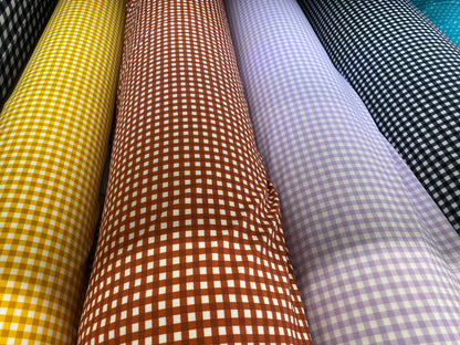 Gingham design 1/4” squares printed in best quality of nylon spandex 4-way stretch 58/60” Sold by the YD. Ships Worldwide from Los Angeles