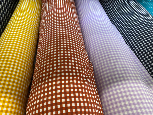 Gingham design 1/4” squares printed in best quality of nylon spandex 4-way stretch 58/60” Sold by the YD. Ships Worldwide from Los Angeles