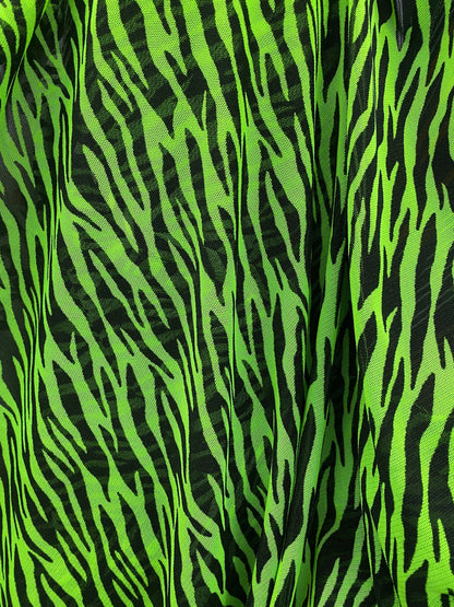 Exotic Zebra design Green/Black print on power mesh 4-way stretch 58/60” Sold by the YD. Ships Worldwide from Los Angeles California USA.