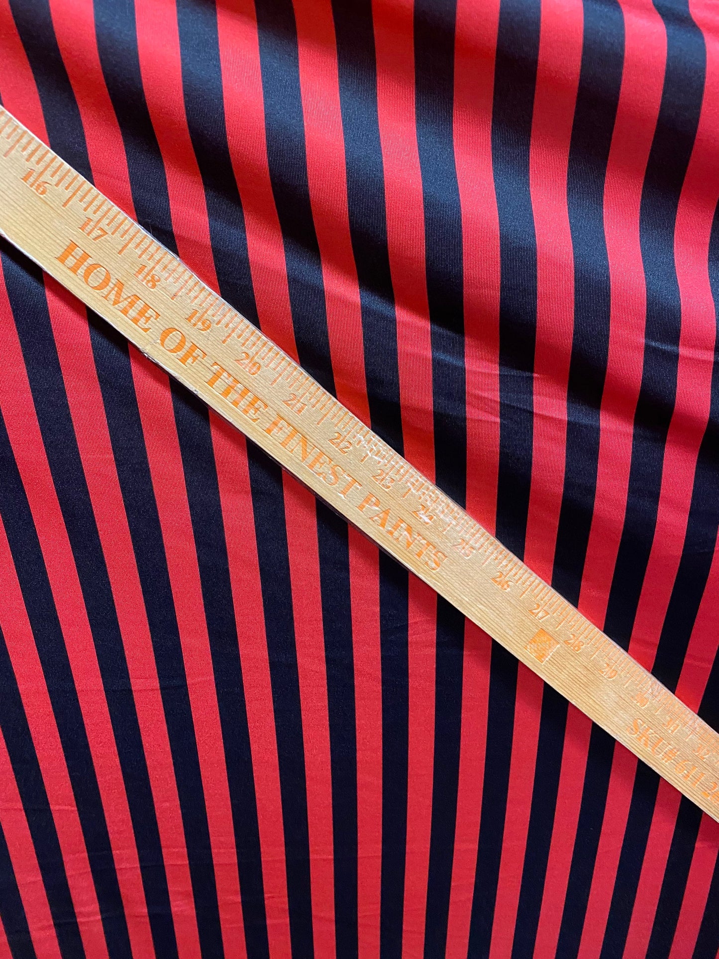 Stripes design 1/2” size  Red/black print on nylon spandex 4-way stretch 58/60” Sold by the YD. Ships Worldwide from Los Angeles California