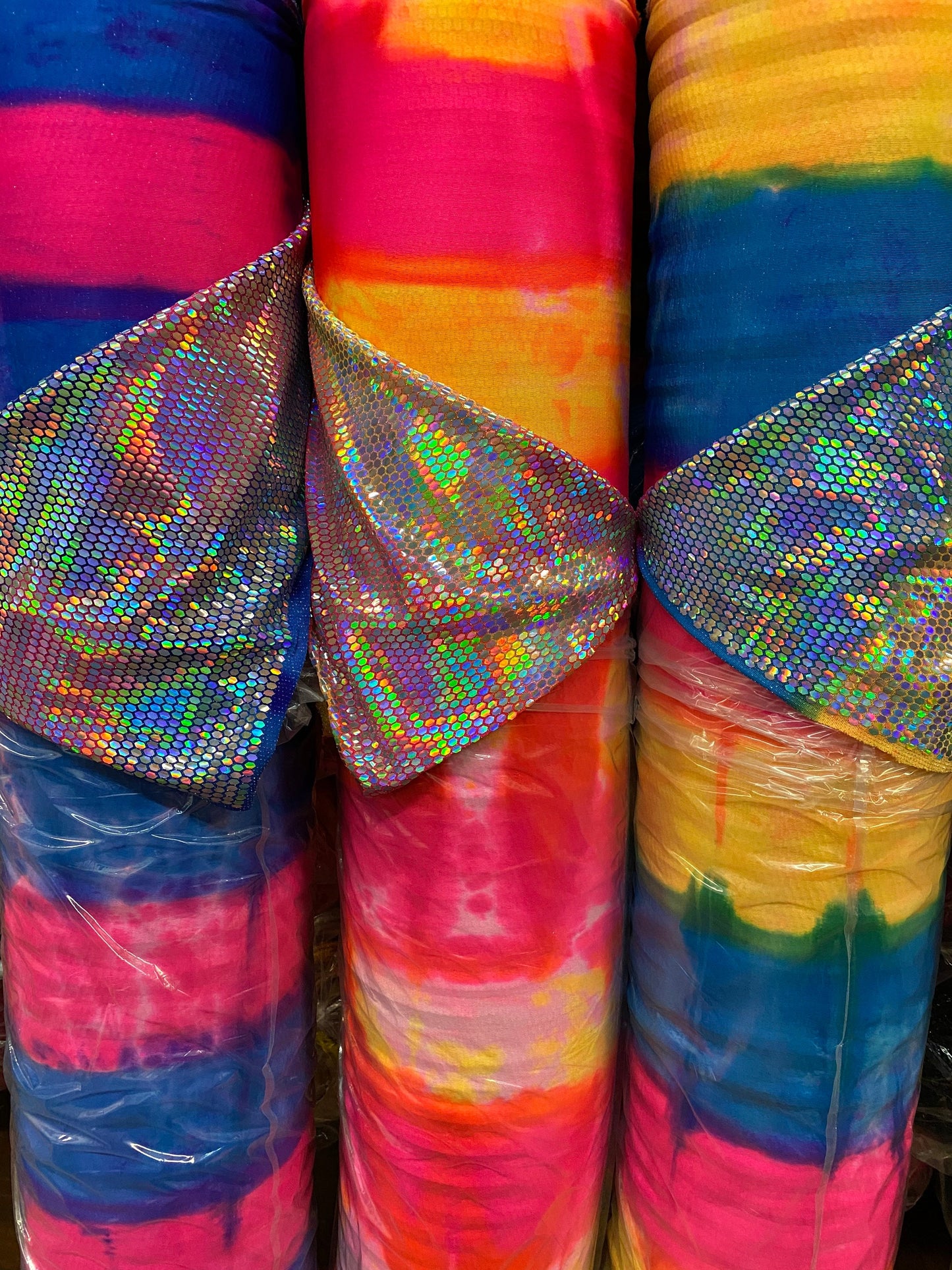 New Tie Dye Honeycomb Iridescence sequins on metallic nylon spandex 2-way stretch 58/60” Sold by the YD. Ships Worldwide from Los Angeles CA