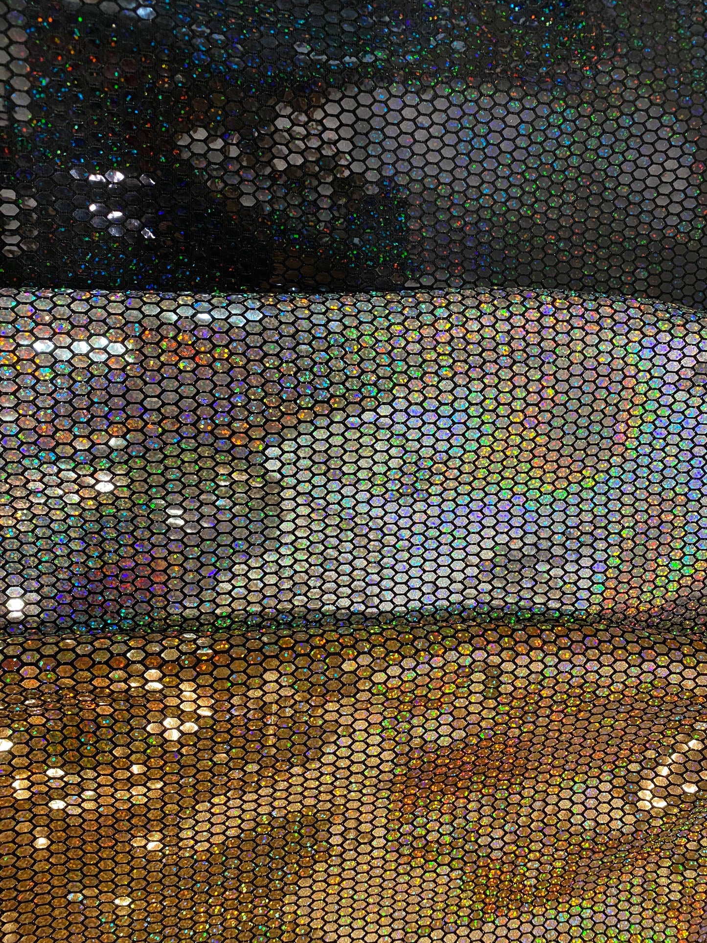 Hexagon Hologram iridescent sequins trans on Nylon metallic 2-way stretch 58/60” Sold by the YD. Ships worldwide from Los Angeles Californ