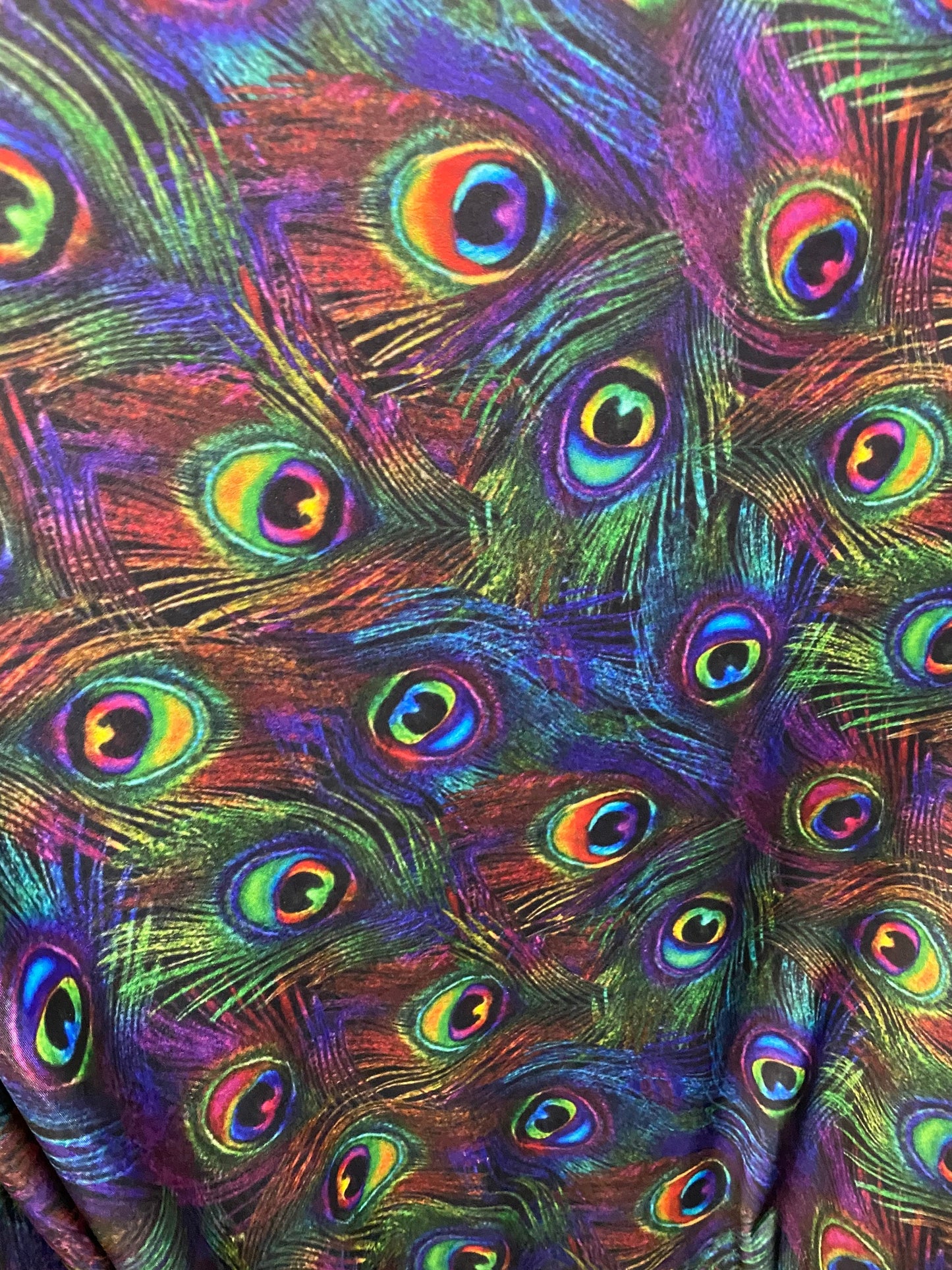 New Exotic peacock design rainbow color print on best quality of nylon spandex 4-way stretch 58/60” Sold by the YD. Ships Worldwide