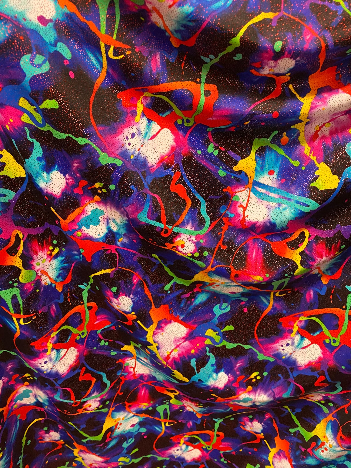 New graffiti paint design with foil nylon spandex  4-way stretch 58/60” sold by the YD. Ships worldwide from Los Angeles California USA.