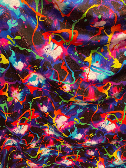 New graffiti paint design with foil nylon spandex  4-way stretch 58/60” sold by the YD. Ships worldwide from Los Angeles California USA.