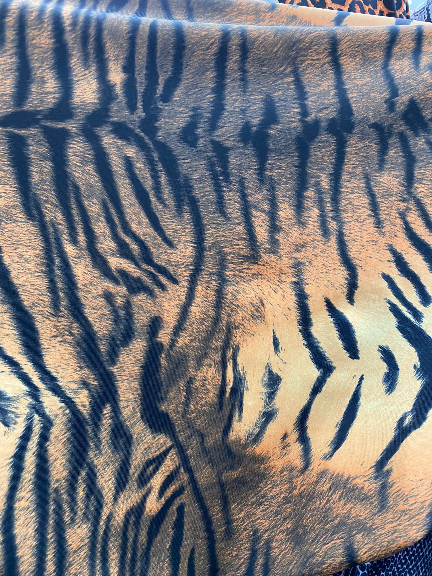 New exotic tiger design print on best quality of nylon spandex 4-way 58/60” Sold by the YD. Ships worldwide from Los Angeles California USA.