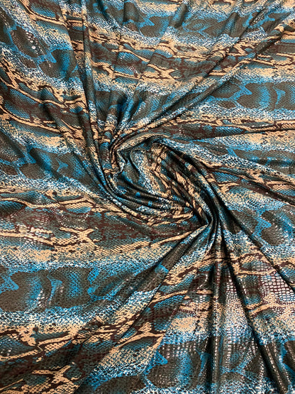 New Anaconda snake design print on poly spandex it’s clear foil medium weight 2-way stretch 58/60” Sold by the YD. Ships Worldwide