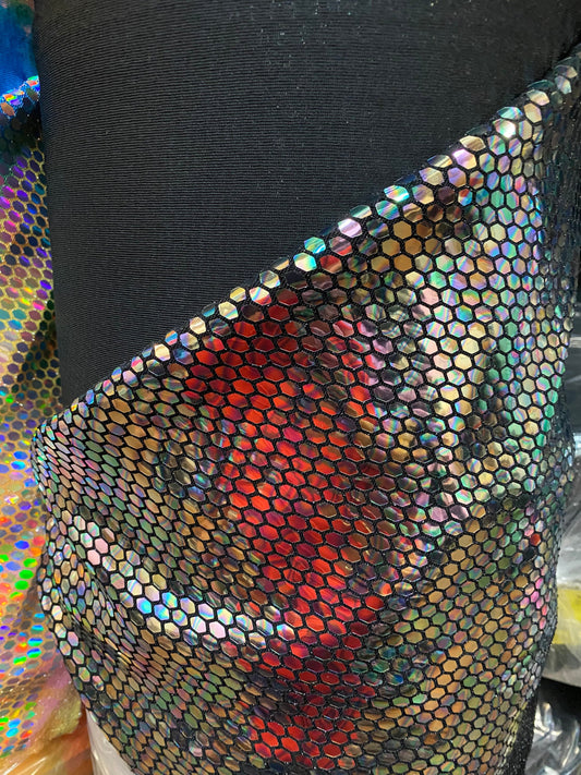 Hexagon Hologram sequins trans on Nylon metallic 2-way stretch 58/60” Sold by the YD. Ships worldwide from Los Angeles California USA.