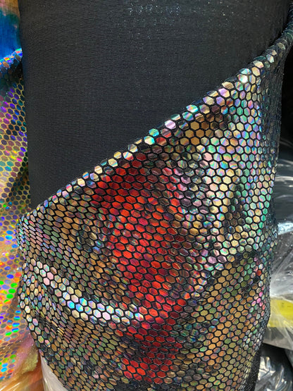 Hexagon Hologram sequins trans on Nylon metallic 2-way stretch 58/60” Sold by the YD. Ships worldwide from Los Angeles California USA.