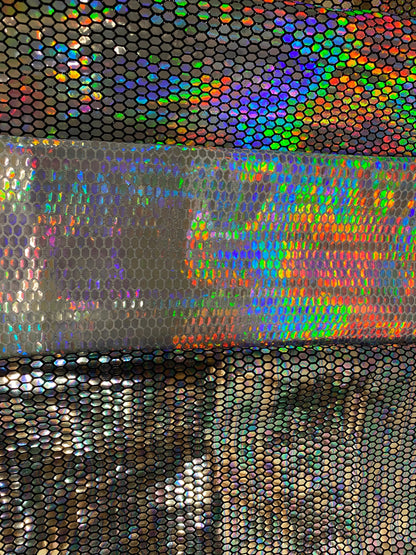 Hexagon Hologram iridescent sequins trans on Nylon metallic 2-way stretch 58/60” Sold by the YD. Ships worldwide from Los Angeles Californ