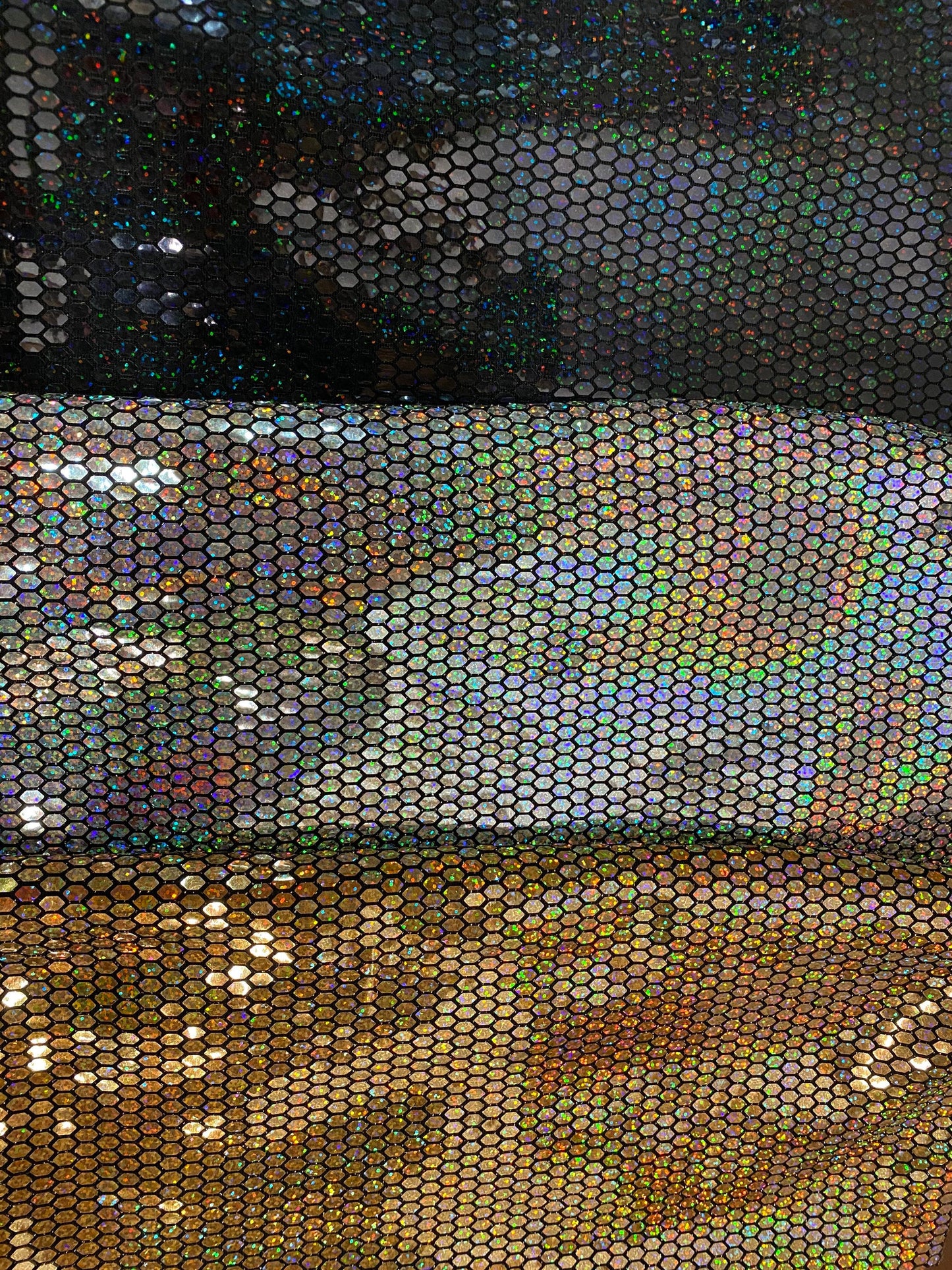 Hexagon Hologram iridescent sequins trans on Nylon metallic 2-way stretch 58/60” Sold by the YD. Ships worldwide from Los Angeles Californ