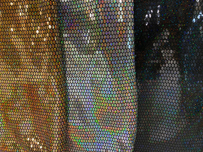 Hexagon Hologram iridescent sequins trans on Nylon metallic 2-way stretch 58/60” Sold by the YD. Ships worldwide from Los Angeles Californ