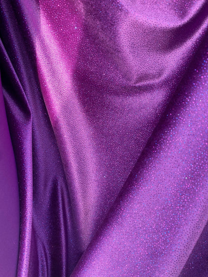 New Selena design eggplant purple stretch velvet with glitter all over medium weight 4-way stretch 58/60” Sold by the YD. Ships Worldwide