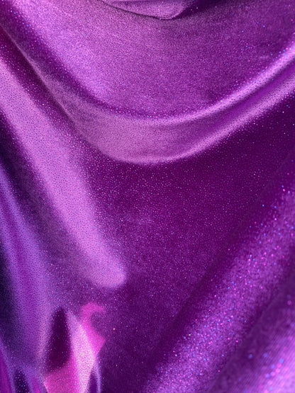 New Selena design eggplant purple stretch velvet with glitter all over medium weight 4-way stretch 58/60” Sold by the YD. Ships Worldwide