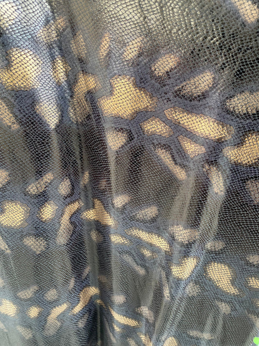 New Exotic animal print design metallic poly spandex 4-way stretch medium weight 58/60” Sold by the YD. Ships Worldwide from Los Ángeles cal