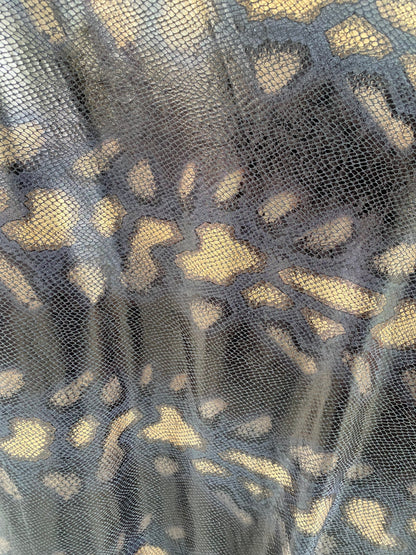 New Exotic animal print design metallic poly spandex 4-way stretch medium weight 58/60” Sold by the YD. Ships Worldwide from Los Ángeles cal