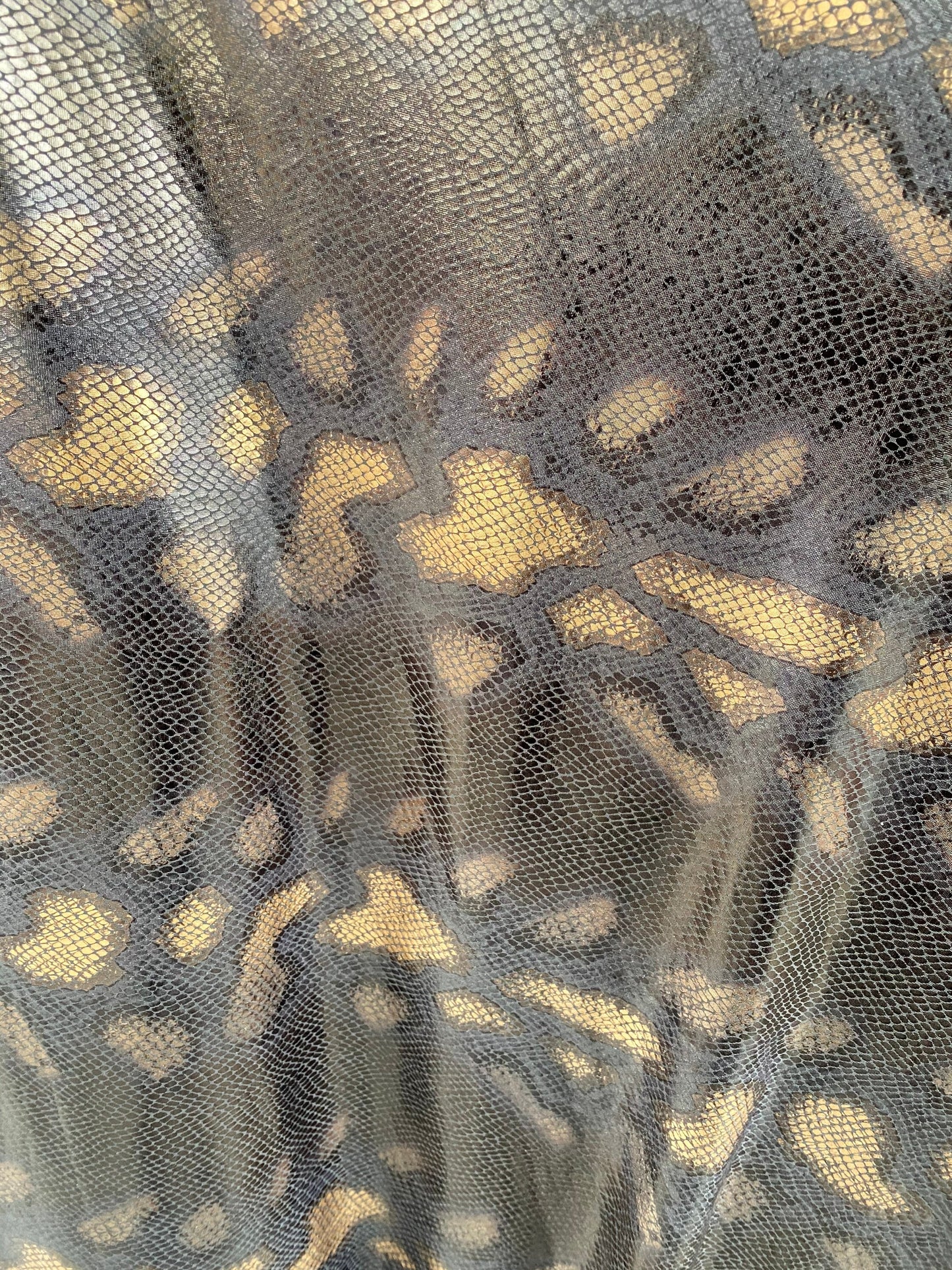 New Exotic animal print design metallic poly spandex 4-way stretch medium weight 58/60” Sold by the YD. Ships Worldwide from Los Ángeles cal