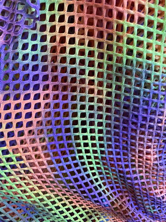 Fishnet Tie Dye design Diamond nylon mesh ;-way stretch 58/60” Sold by the YD. Ships worldwide from Los Angeles California USA.