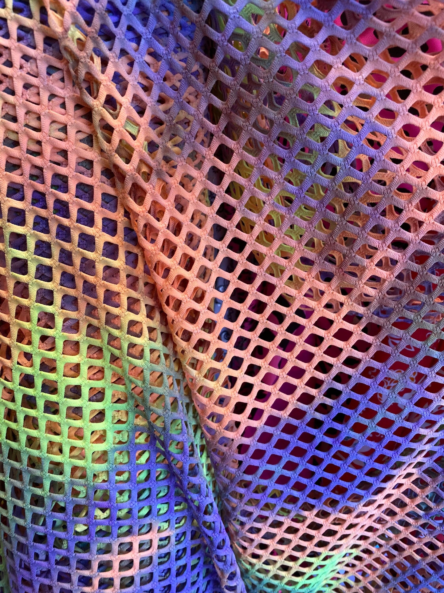 Fishnet Tie Dye design Diamond nylon mesh ;-way stretch 58/60” Sold by the YD. Ships worldwide from Los Angeles California USA.