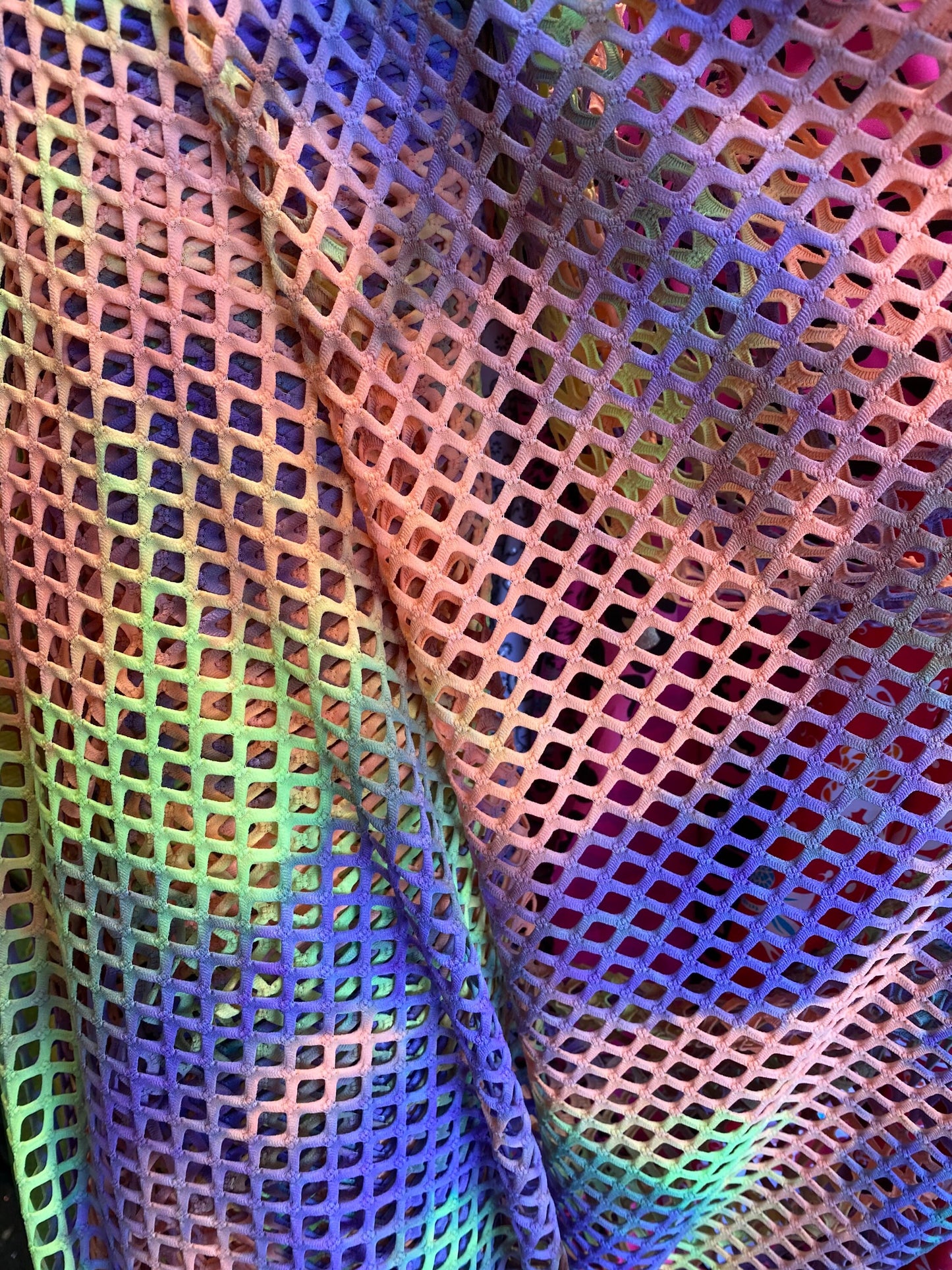 Fishnet Tie Dye design Diamond nylon mesh ;-way stretch 58/60” Sold by the YD. Ships worldwide from Los Angeles California USA.