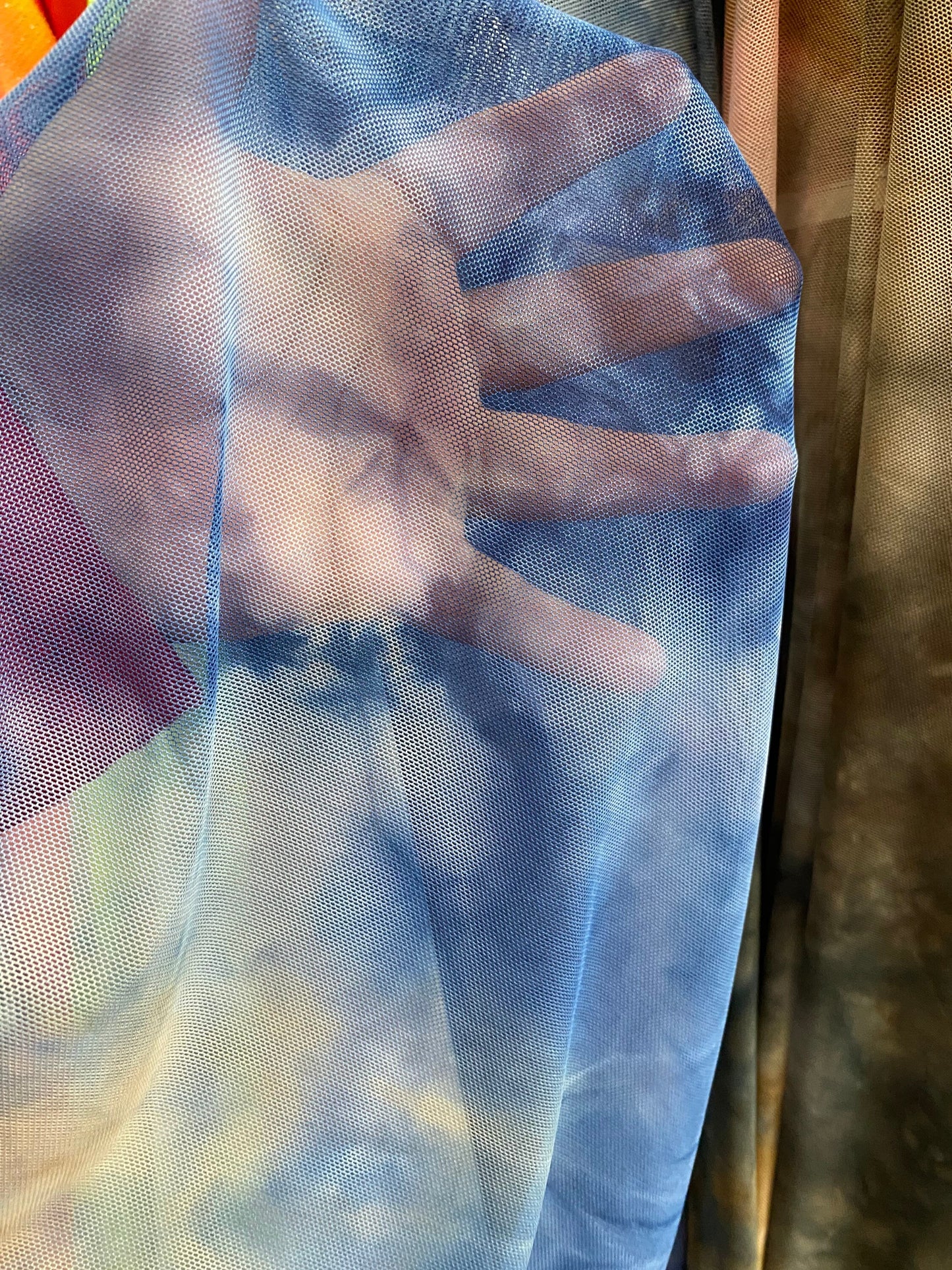 Tie dye power mesh multicolor 4-way stretch 58/60” Sold by the YD. Ships Worldwide from Los Angeles California USA.