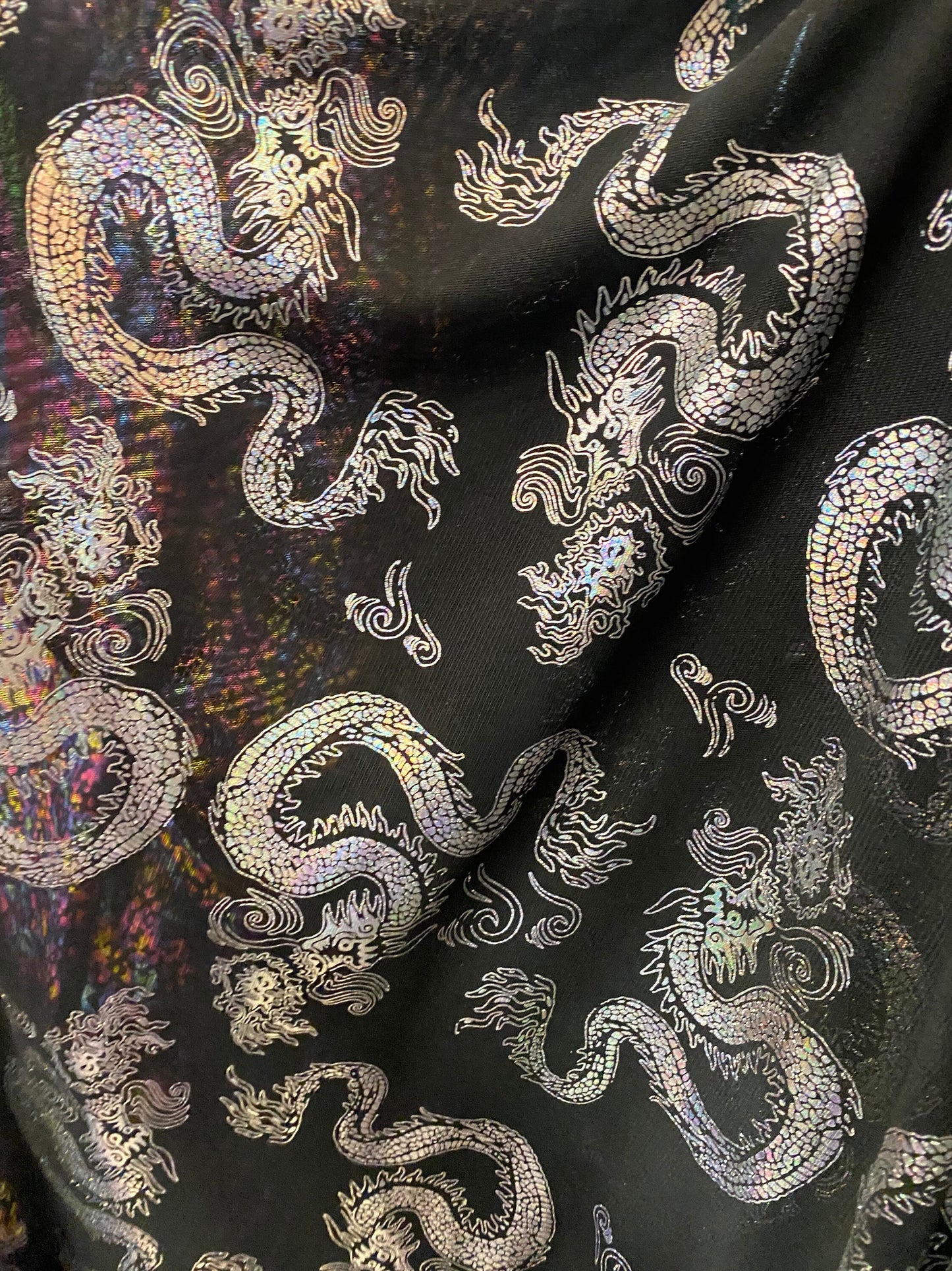 New Exotic Dragon design print on power mesh black/silver 4-way stretch 58/60” Sold by the YD. Ships Worldwide from Los Angeles California