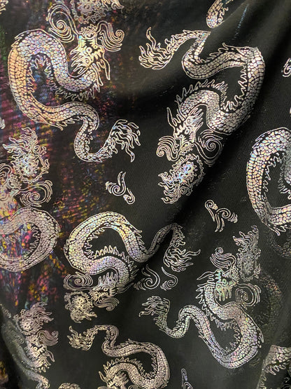 New Exotic Dragon design print on power mesh black/silver 4-way stretch 58/60” Sold by the YD. Ships Worldwide from Los Angeles California