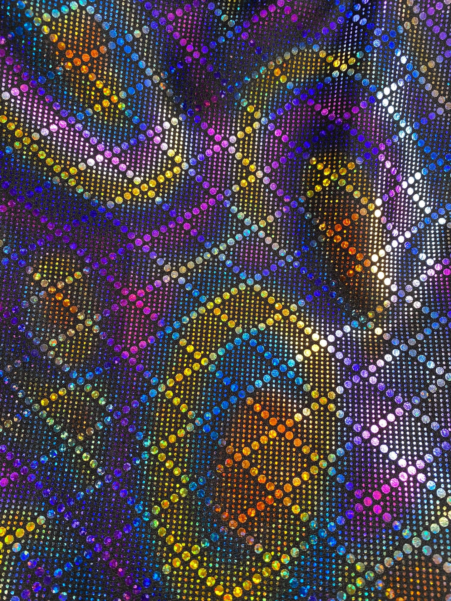 New Diamond design hologram metallic nylon spandex 4-way stretch 58/60” Sold by the YD. Ships Worldwide from Los Angeles California USA.