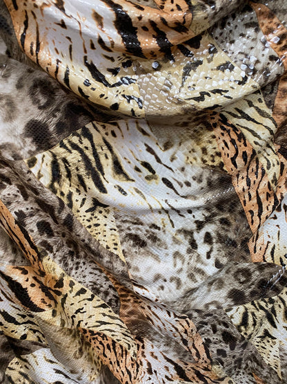 New Exotic multi animal print Taupe multicolor with clear foil print on poly spandex 2-way stretch 58-60” Sold by the YD. Ships Worldwide